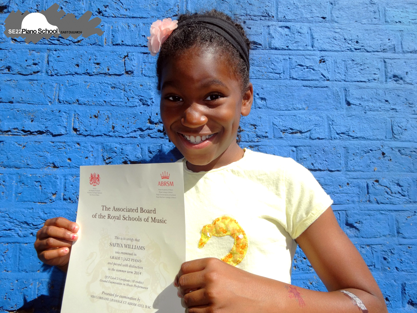 Summer 2014 - Here's Safiya (age 8) with her Grade 5 Distinction Jazz Piano Certificate. Click here to see more of our students' exam results.